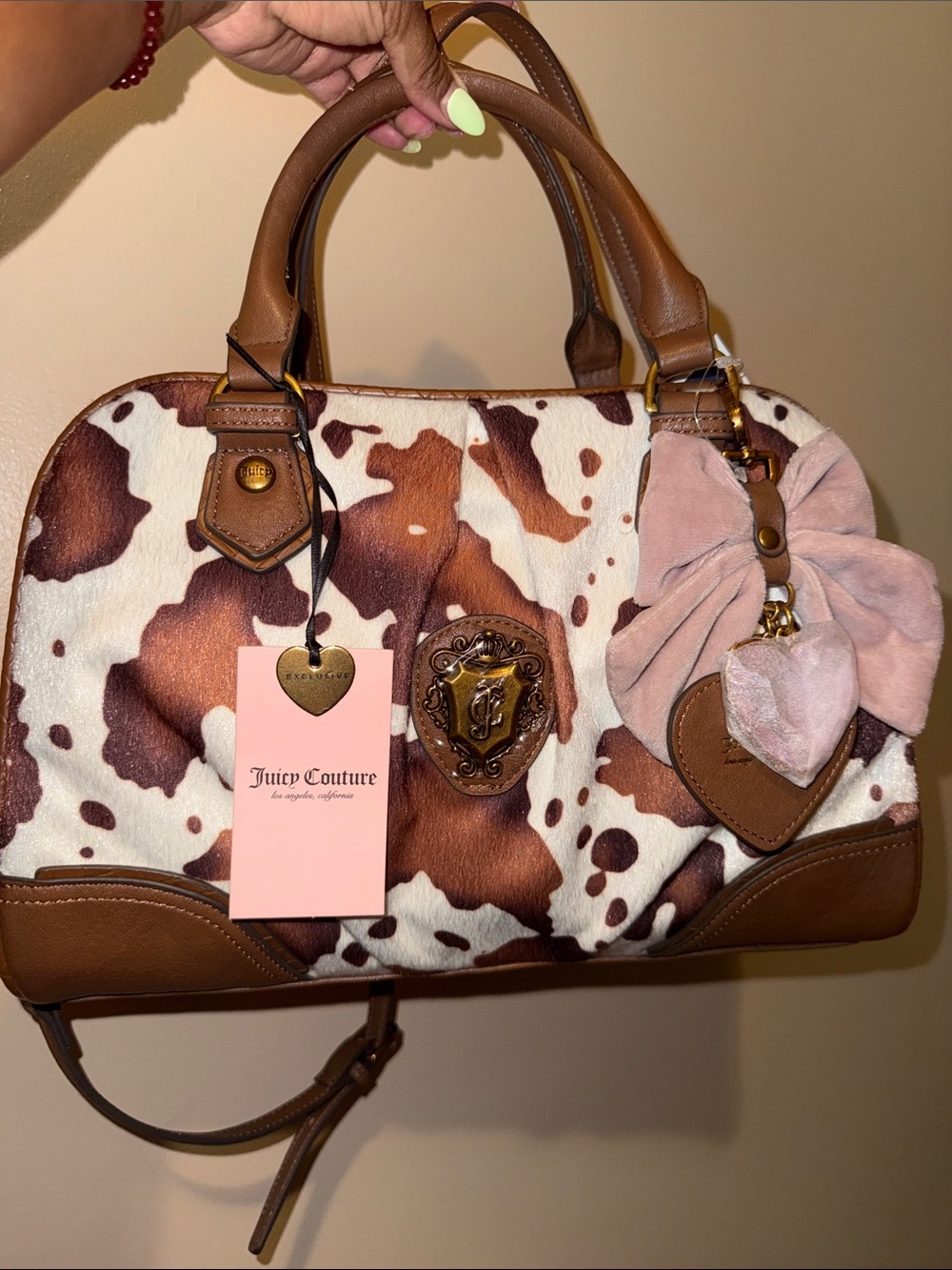 Juicy Romance Cow Satchel
Color : Saddle/ White with cow hide faux fur